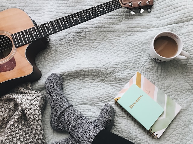 guitar, socks, coffee, journal